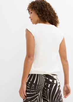 Camiseta con puños elásticos