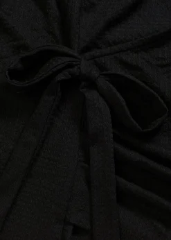 Camiseta de crepé de punto con aspecto cruzado