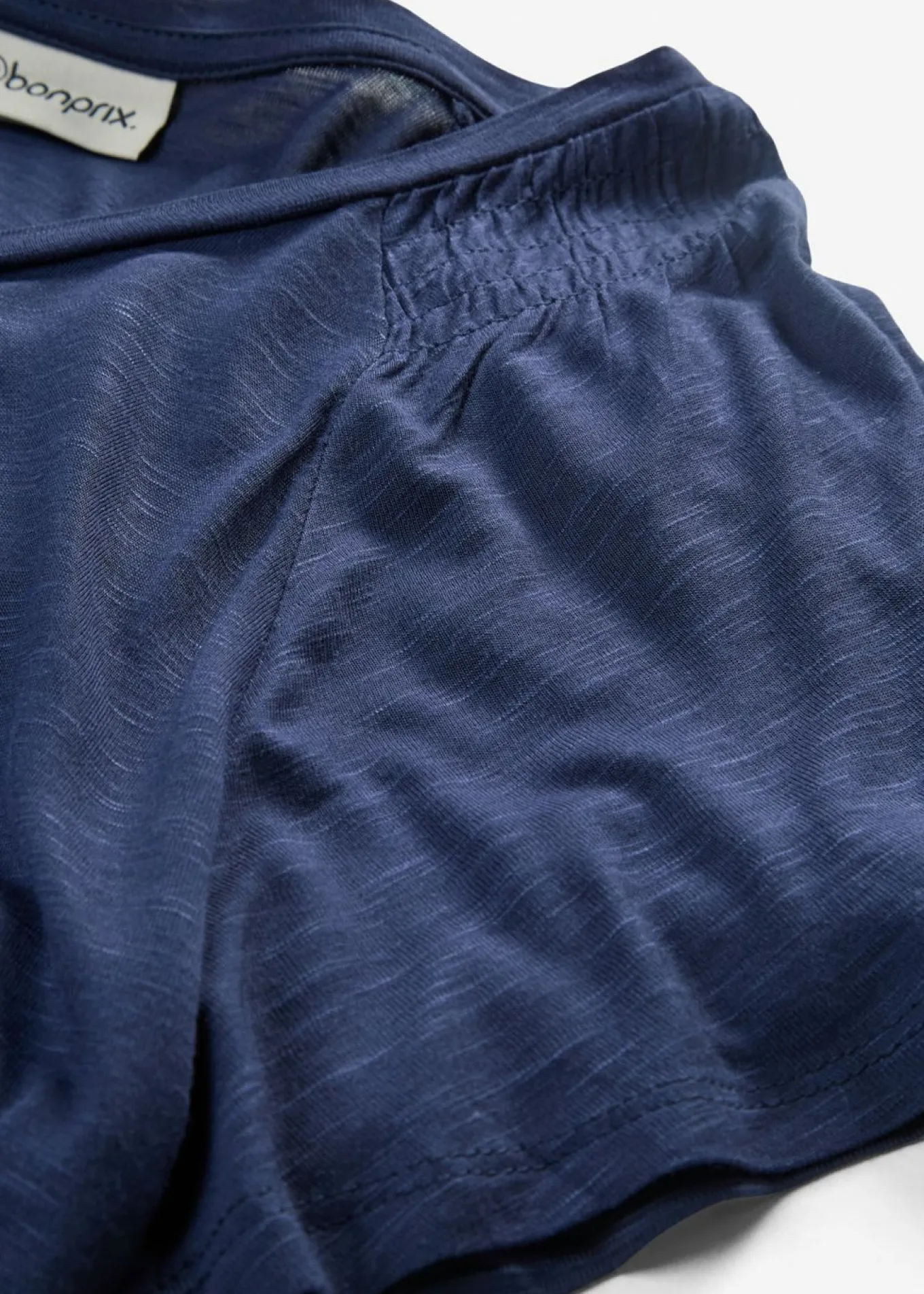 Camiseta de hilo flameado con mangas de murciélago