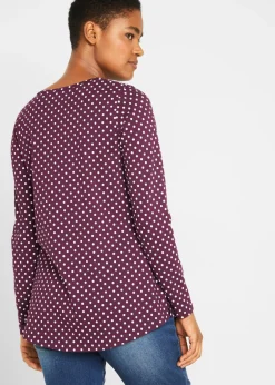 Camiseta de manga larga de lunares con aberturas laterales