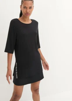 Camiseta deportiva larga con abertura y material de secado rápido