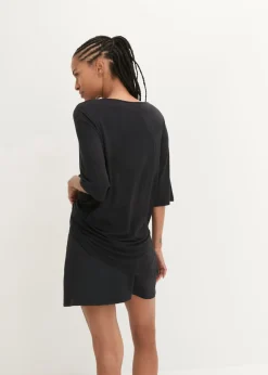 Camiseta deportiva larga con abertura y material de secado rápido