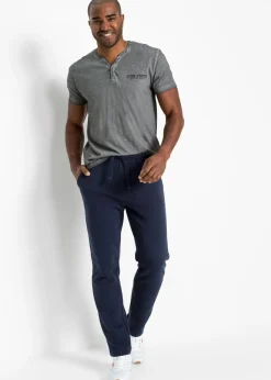 Camiseta henley de algodón orgánico puro con manga corta y aspecto lavado