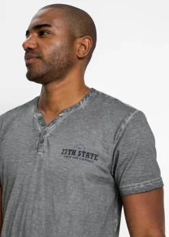 Camiseta henley de algodón orgánico puro con manga corta y aspecto lavado