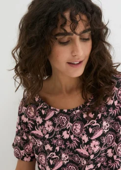 Camiseta holgada de hilo flameado de algodón orgánico con dobladillo redondeado