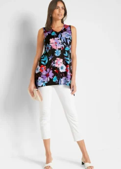 Camiseta larga con borde irregular