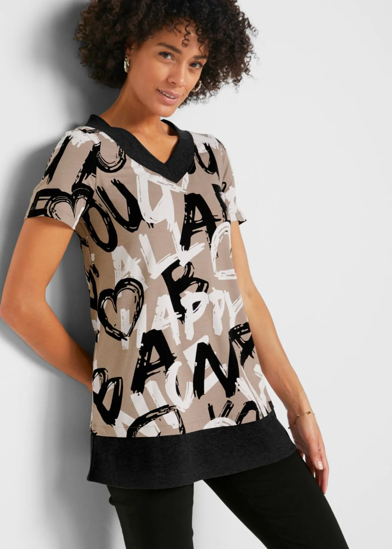 Camiseta larga con manga corta