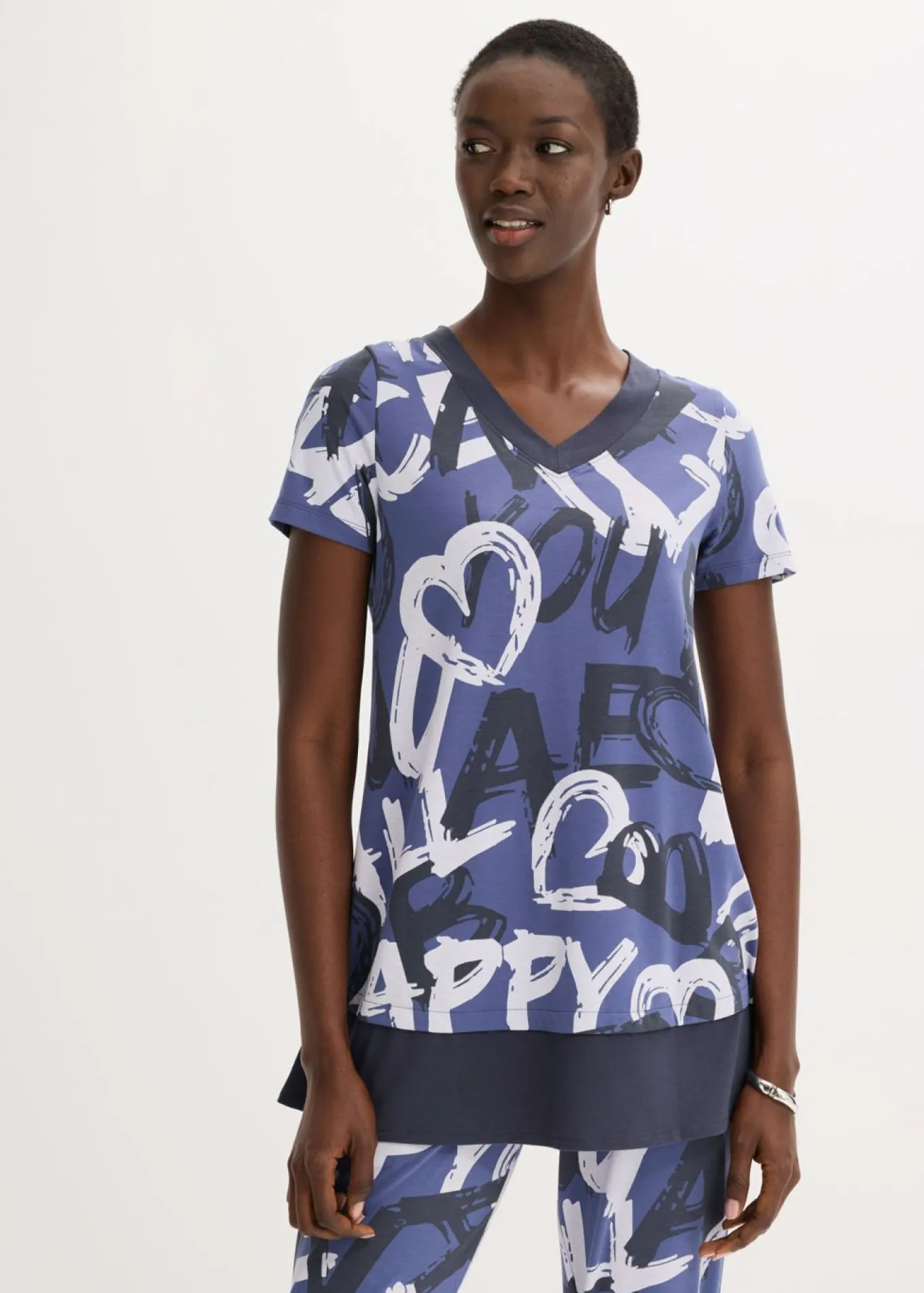 Camiseta larga con manga corta