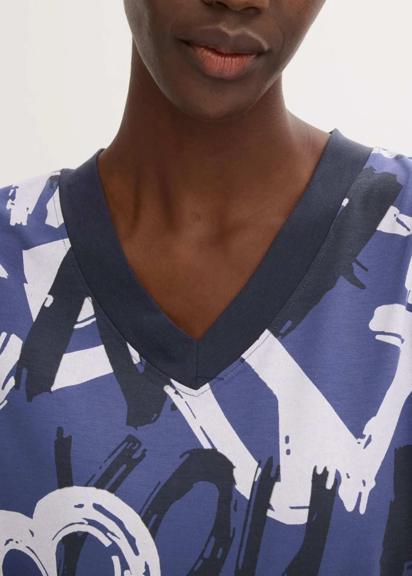 Camiseta larga con manga corta