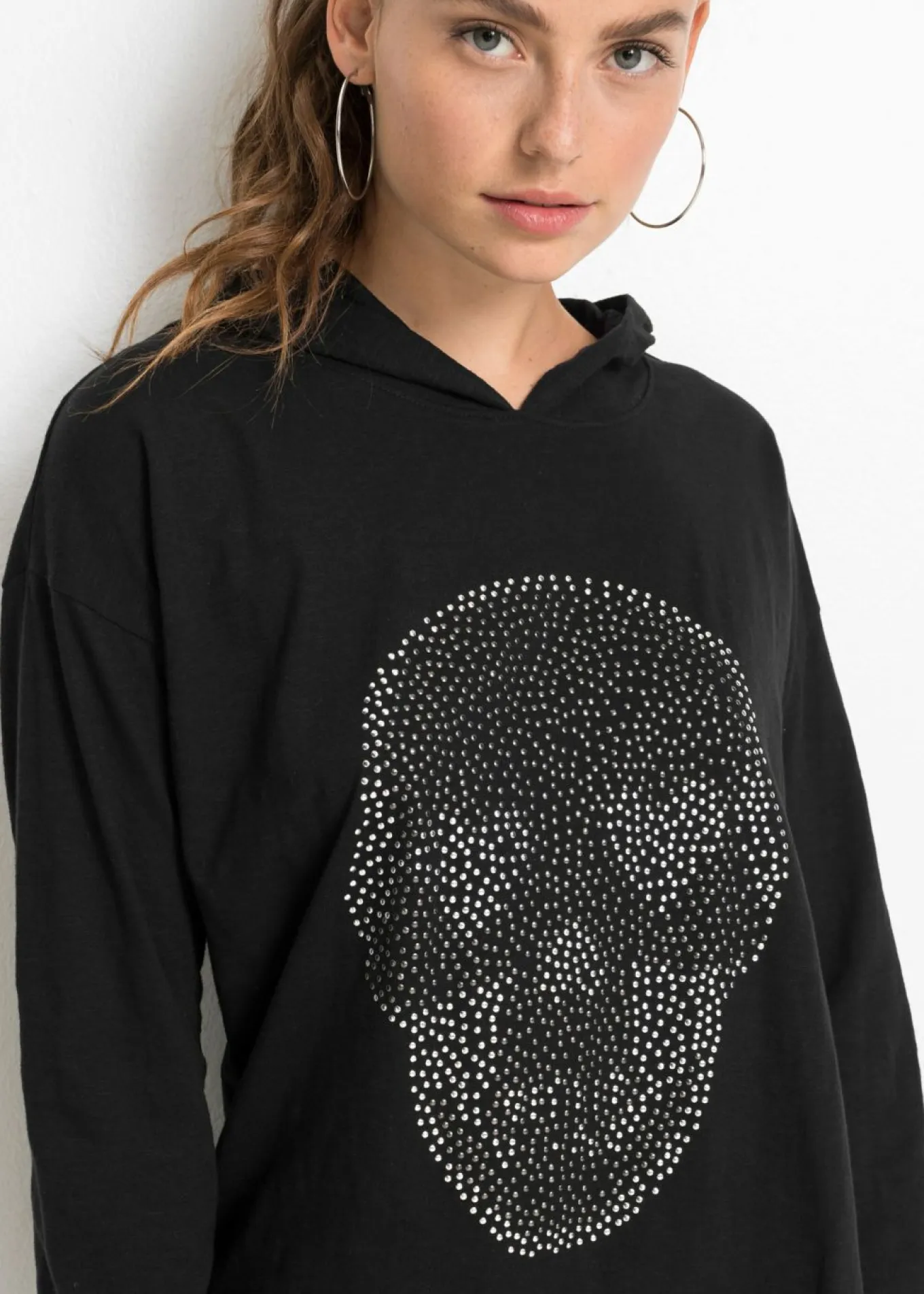 Camiseta larga oversize con capucha
