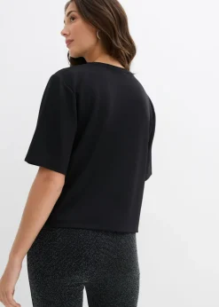 Camiseta oversize con aplicaciones