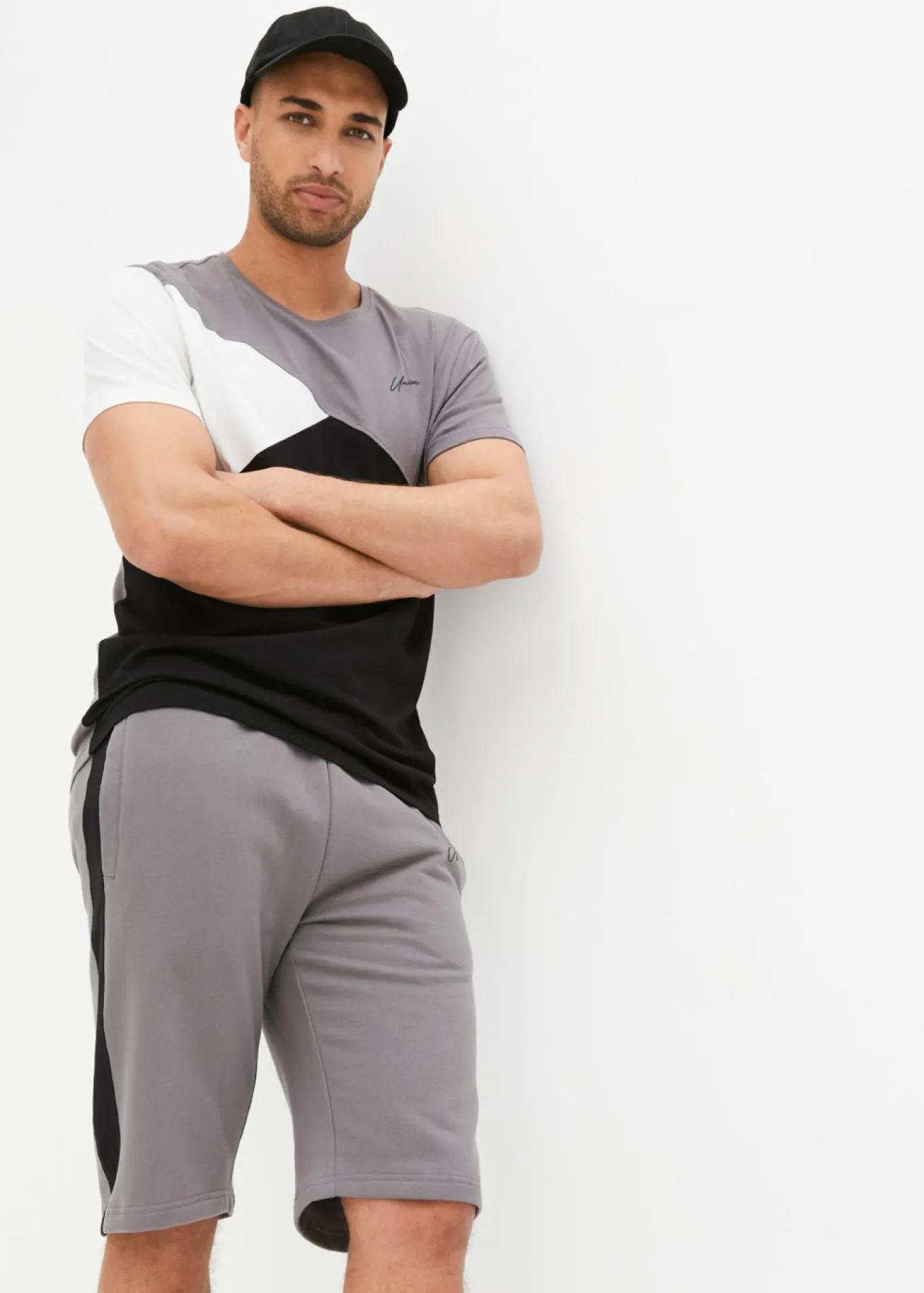 Camiseta y bermudas de chándal (2 piezas)