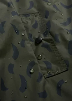 Capa impermeable premamá 3 en 1 con inserto de porteo y bolsa