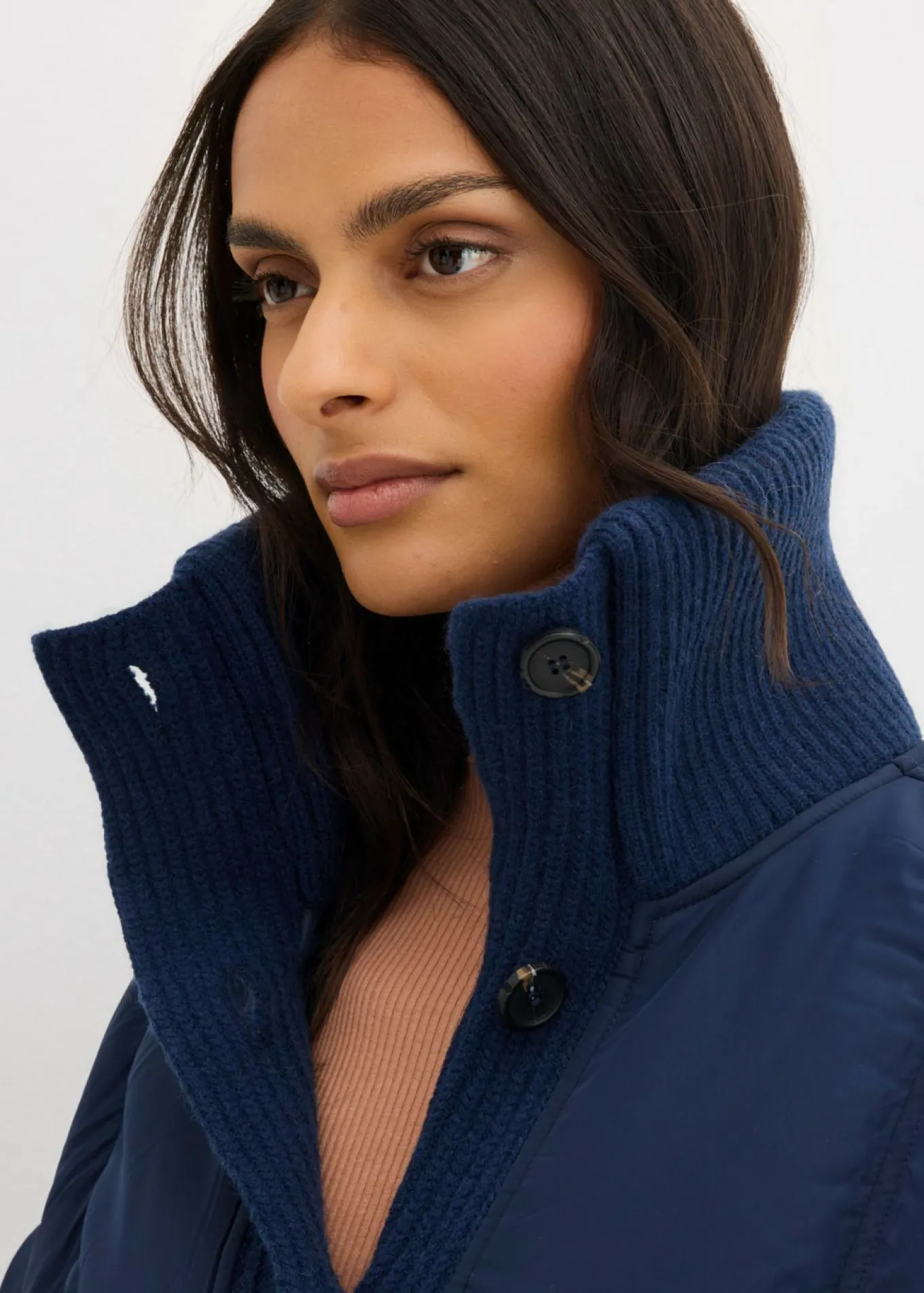 Chaqueta acolchada con puños de punto