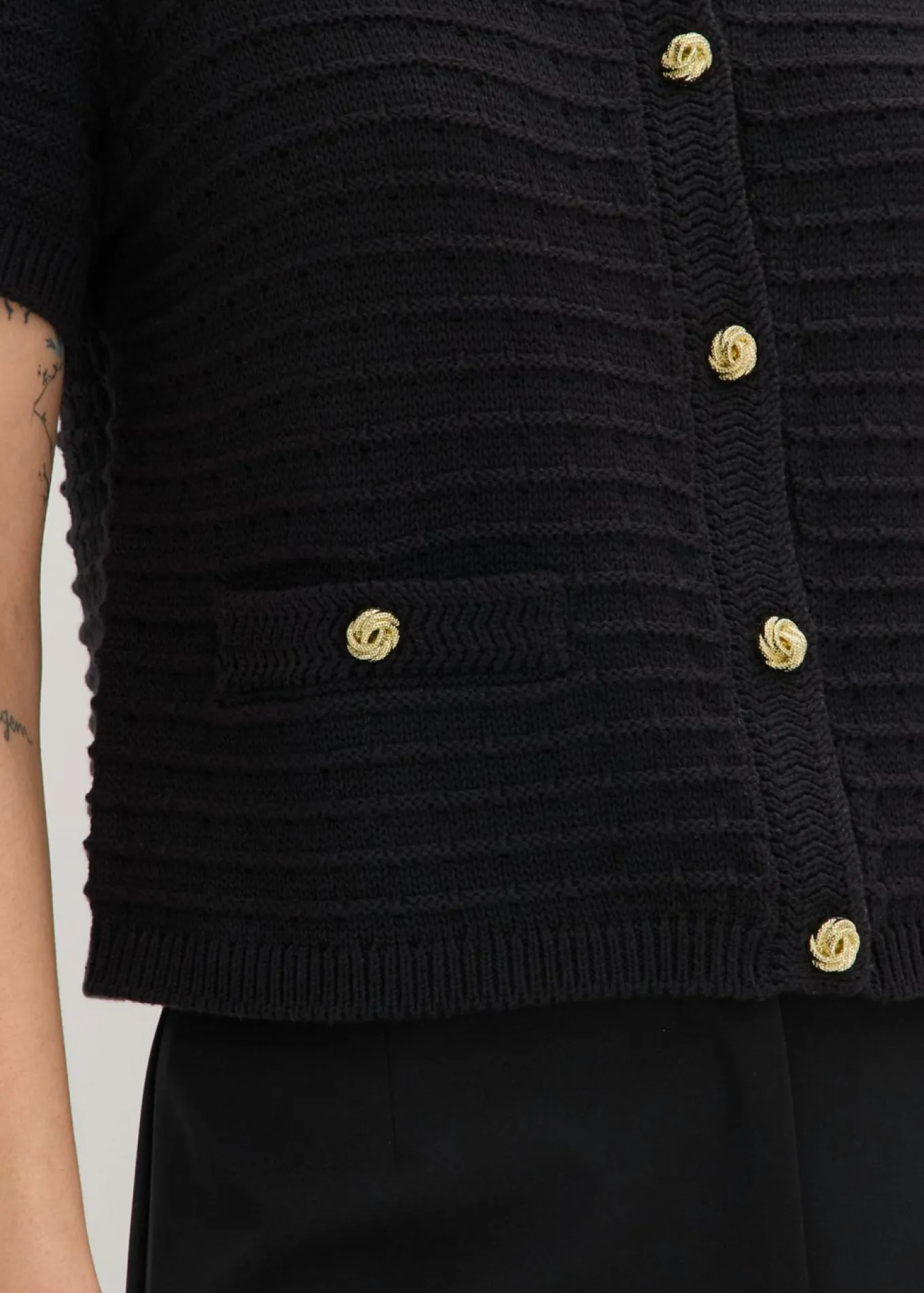 Chaqueta de punto con botones decorativos
