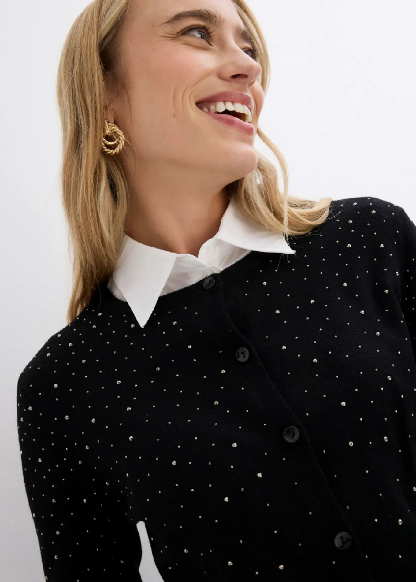 Chaqueta de punto con piedras brillantes