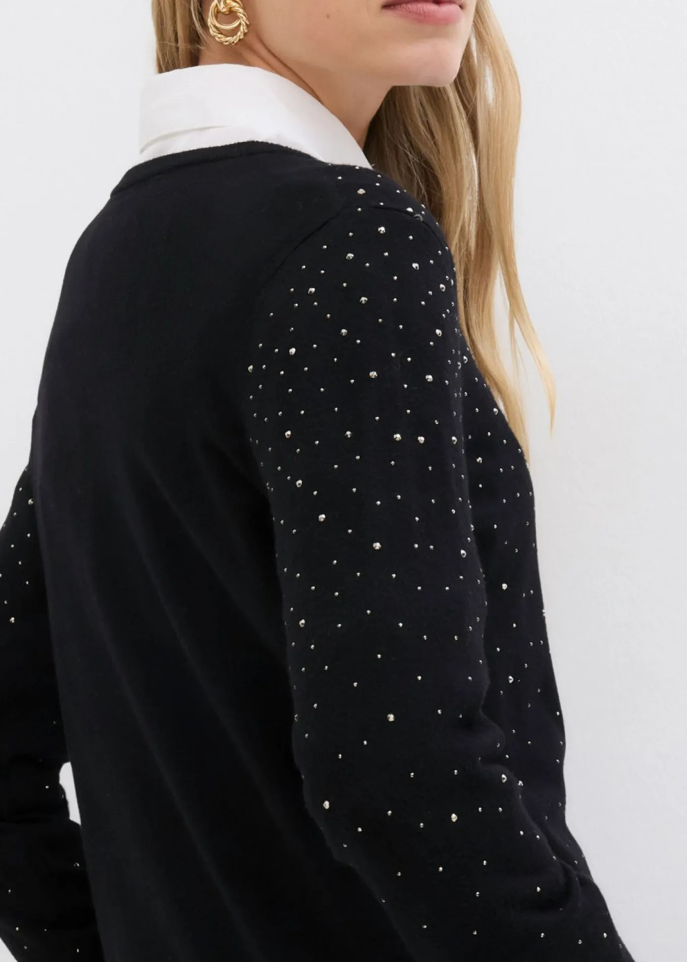 Chaqueta de punto con piedras brillantes