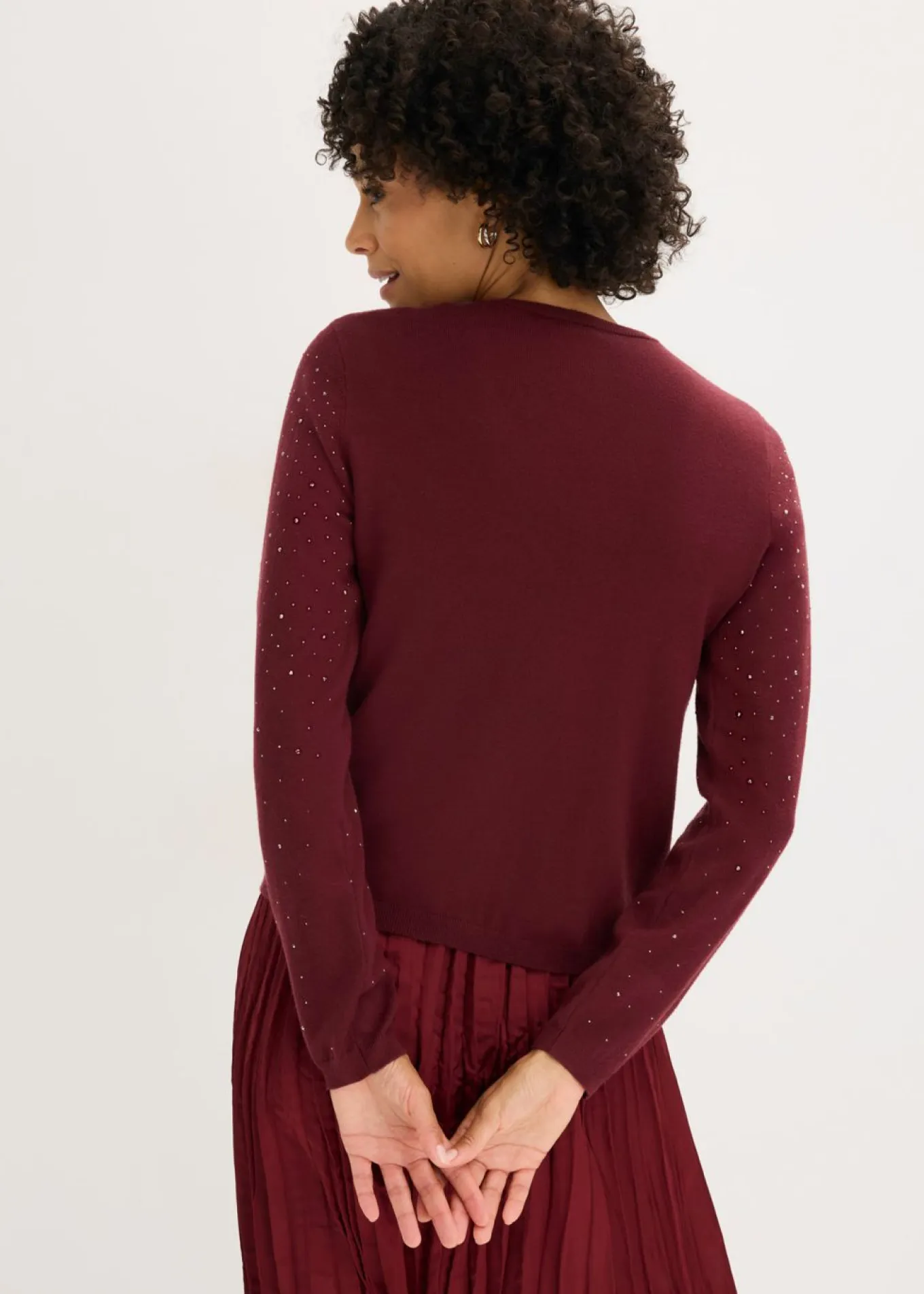 Chaqueta de punto con piedras brillantes