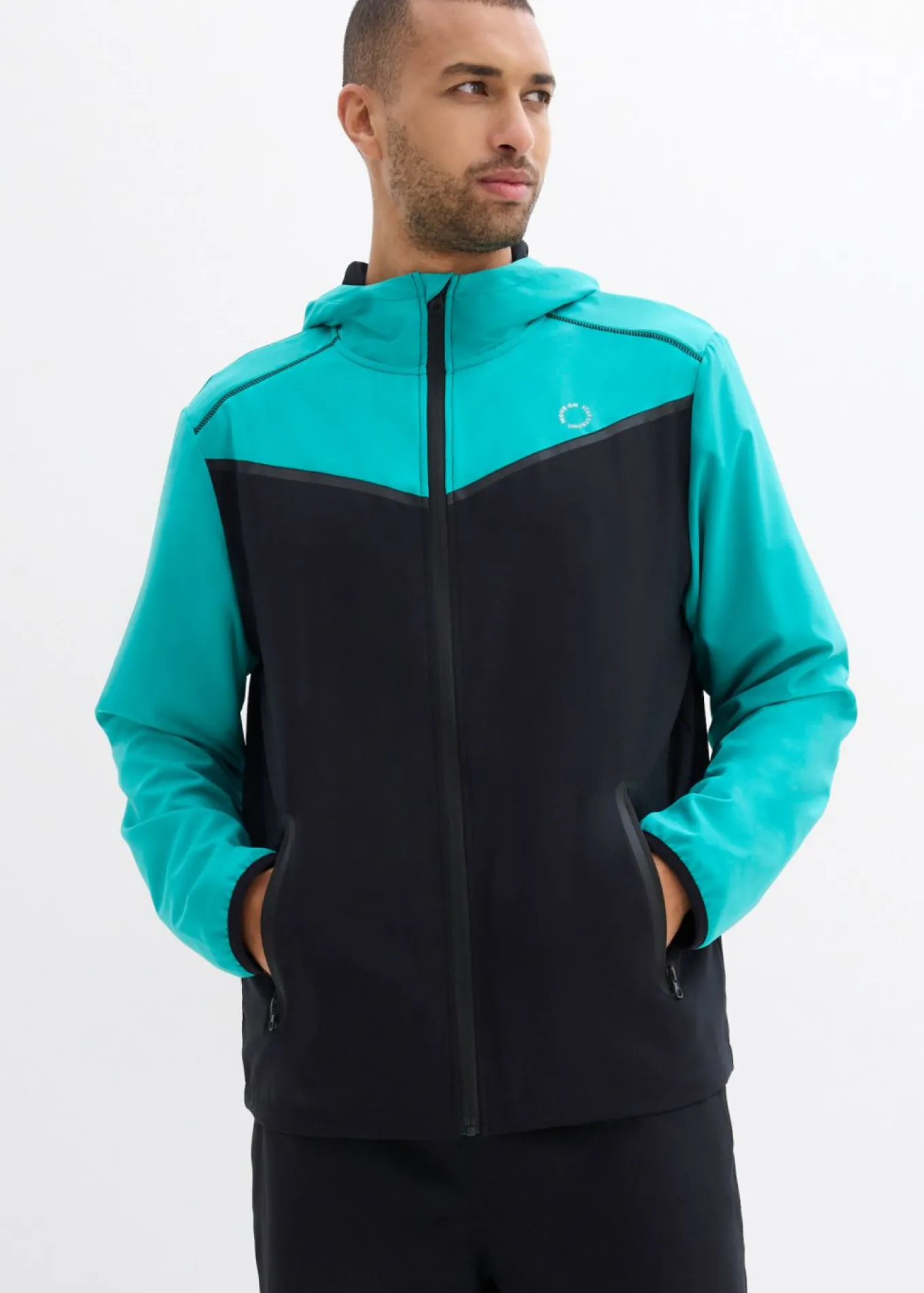 Chaqueta deportiva ligera de material de secado rápido para hombres