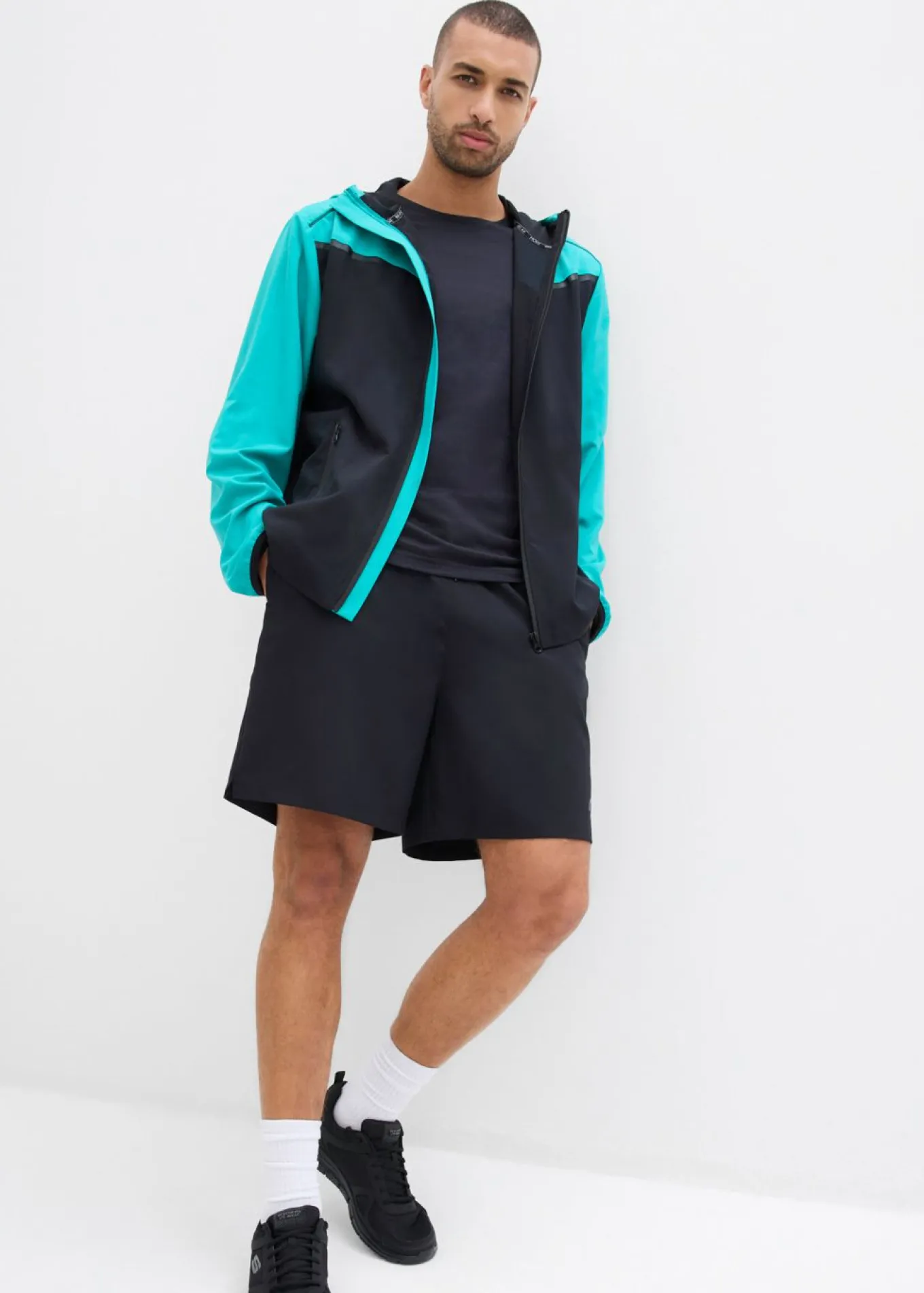 Chaqueta deportiva ligera de material de secado rápido para hombres