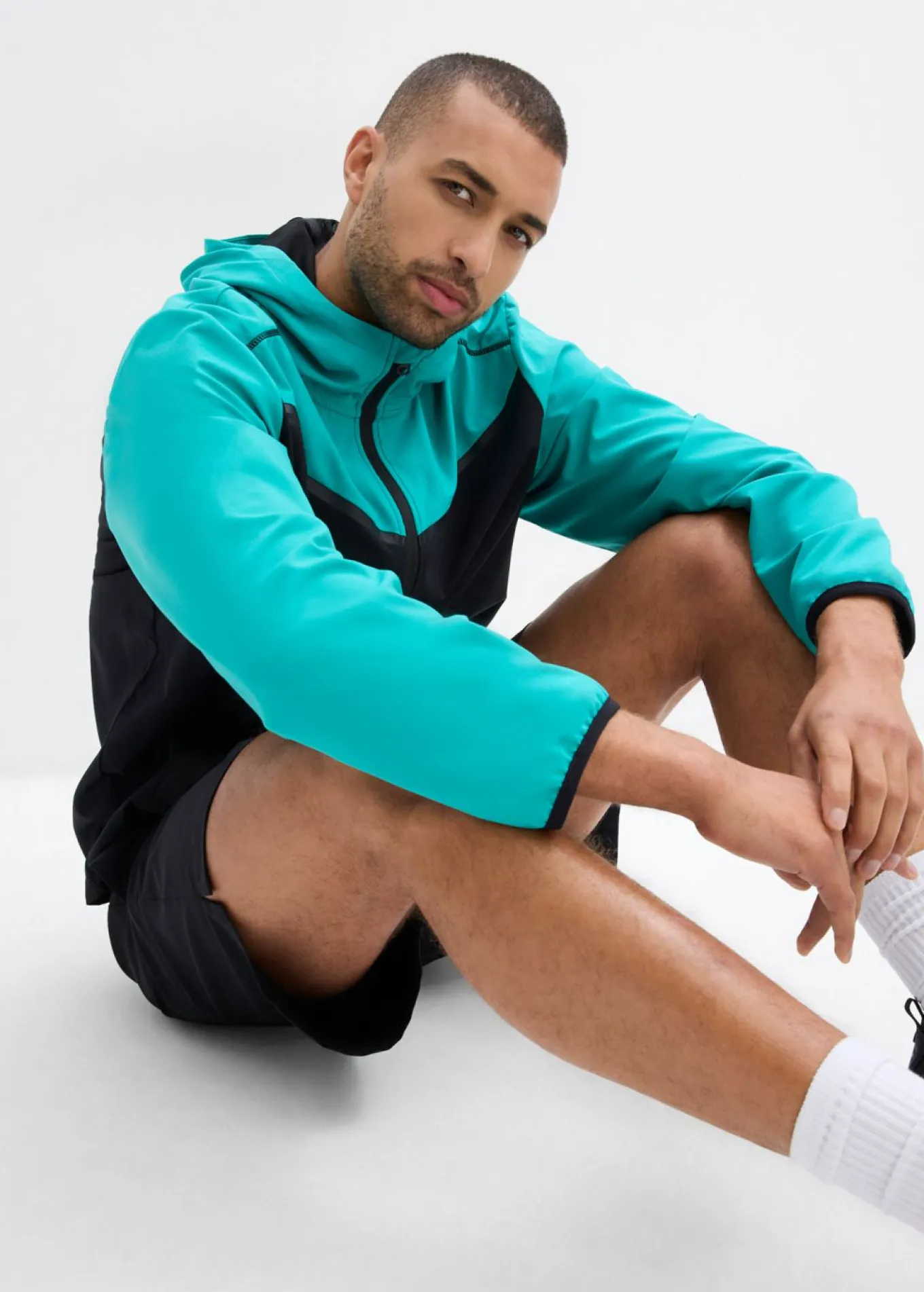 Chaqueta deportiva ligera de material de secado rápido para hombres