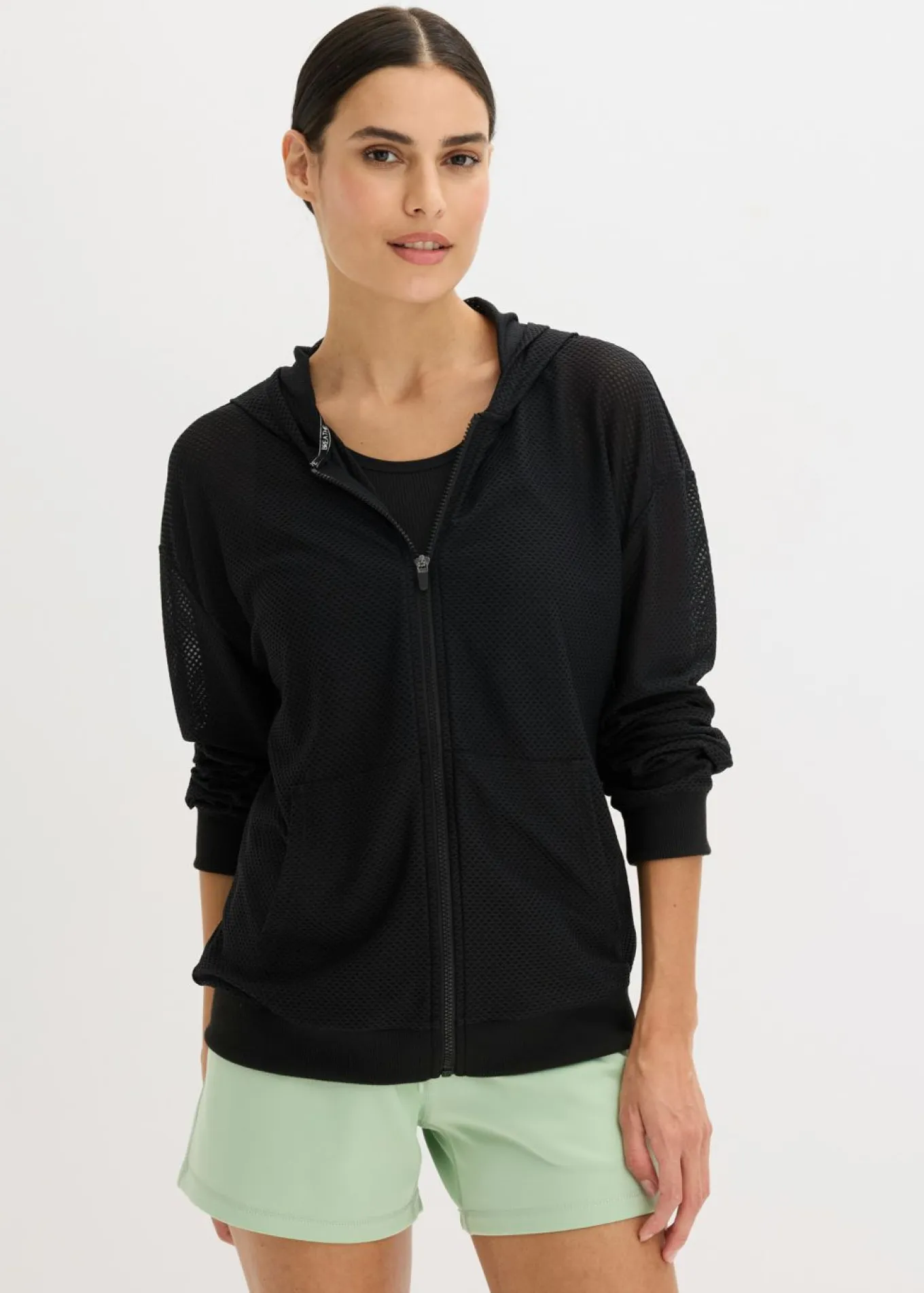Chaqueta deportiva transparente de malla con corte holgado