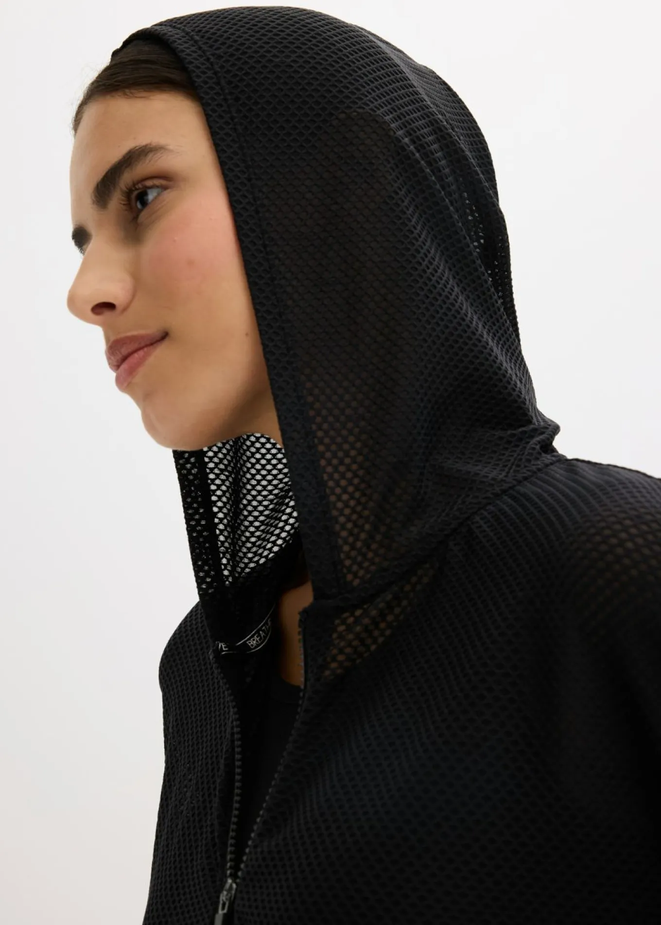 Chaqueta deportiva transparente de malla con corte holgado