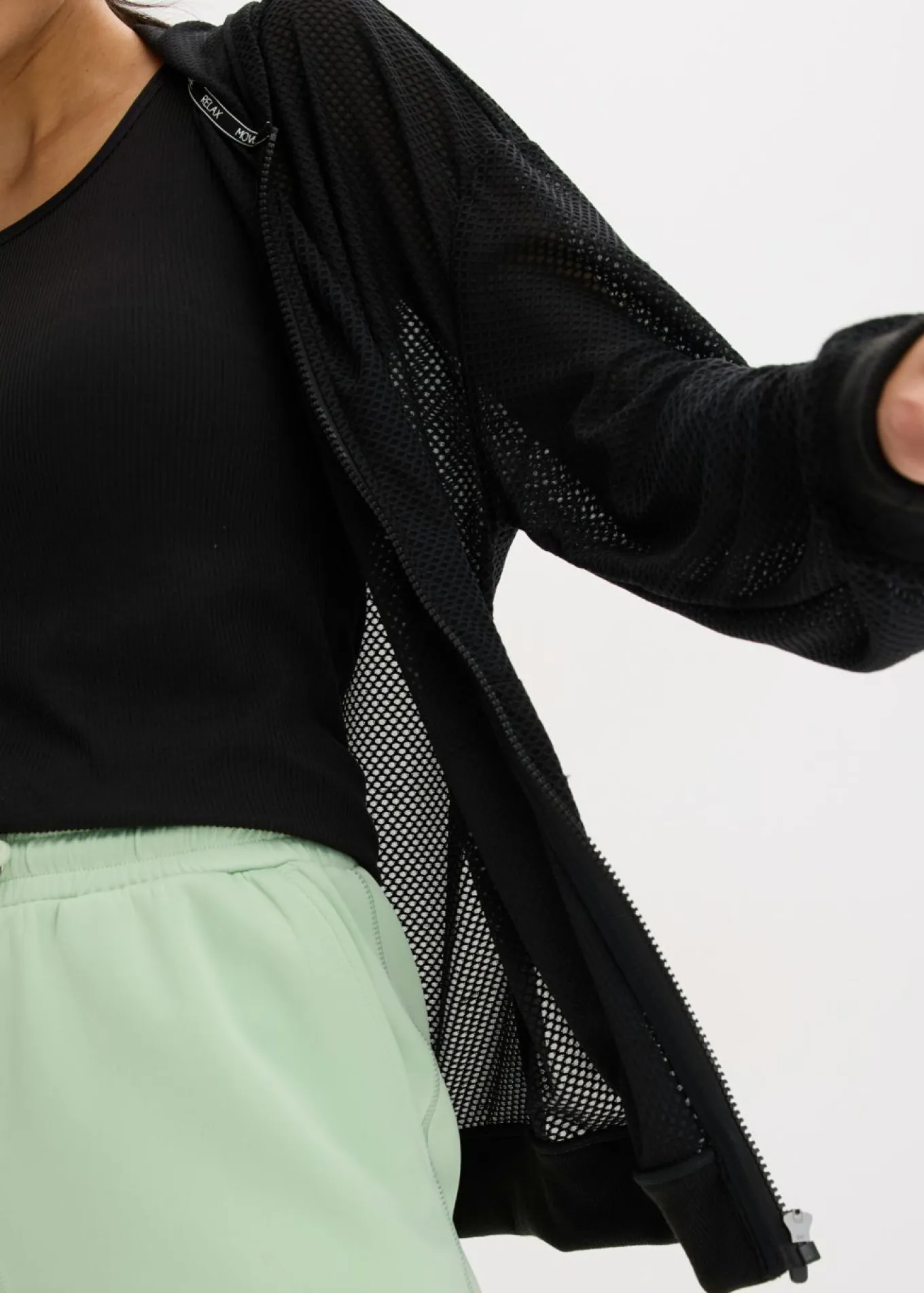 Chaqueta deportiva transparente de malla con corte holgado