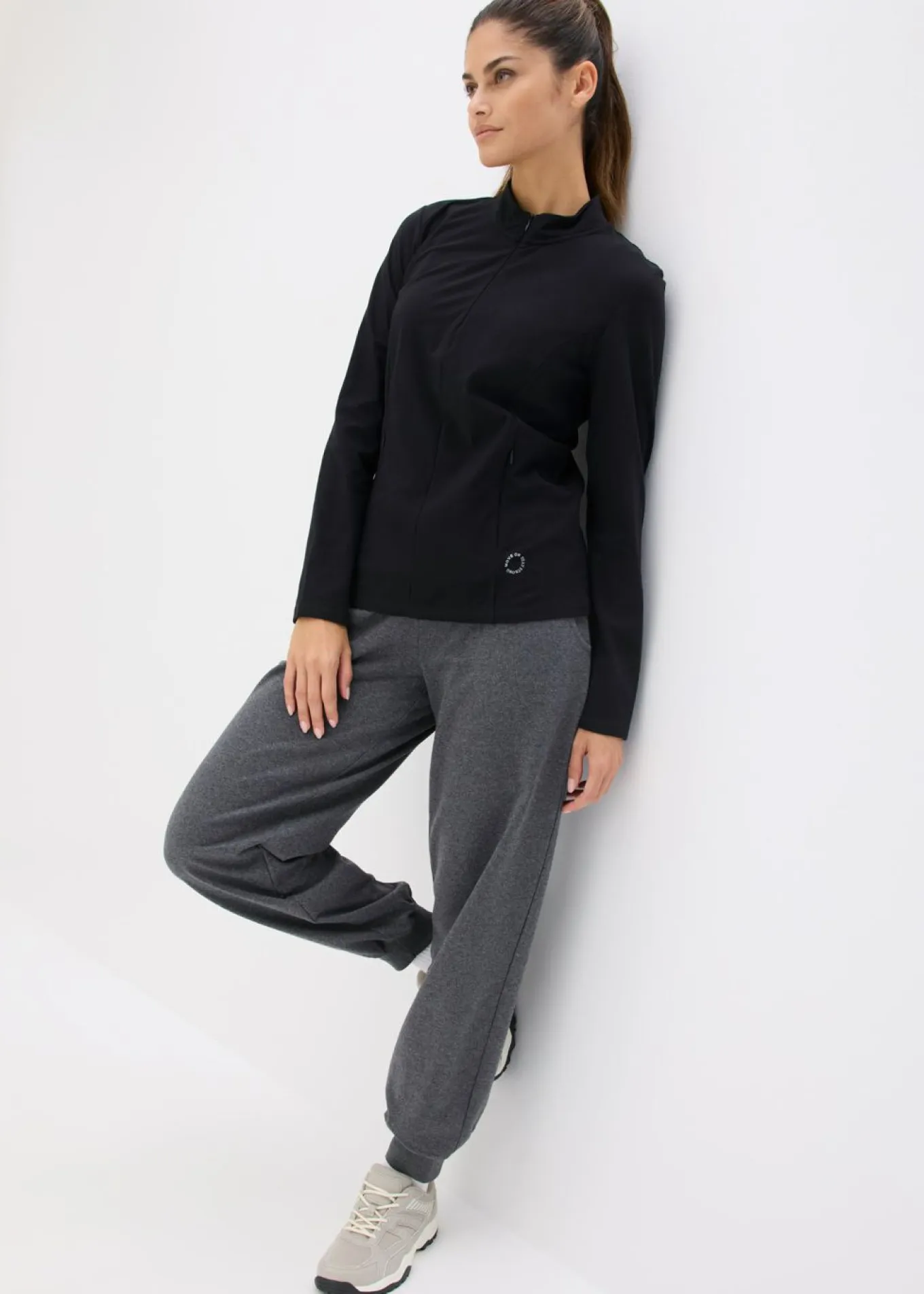 Chaqueta deportiva térmica con media cremallera y material de secado rápido
