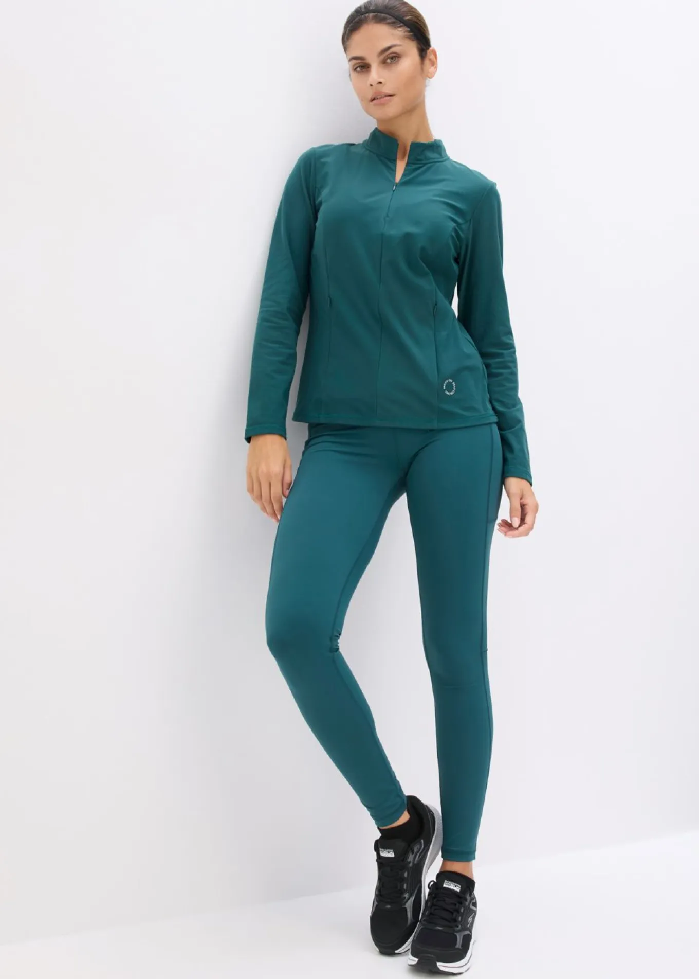 Chaqueta deportiva térmica con media cremallera y material de secado rápido