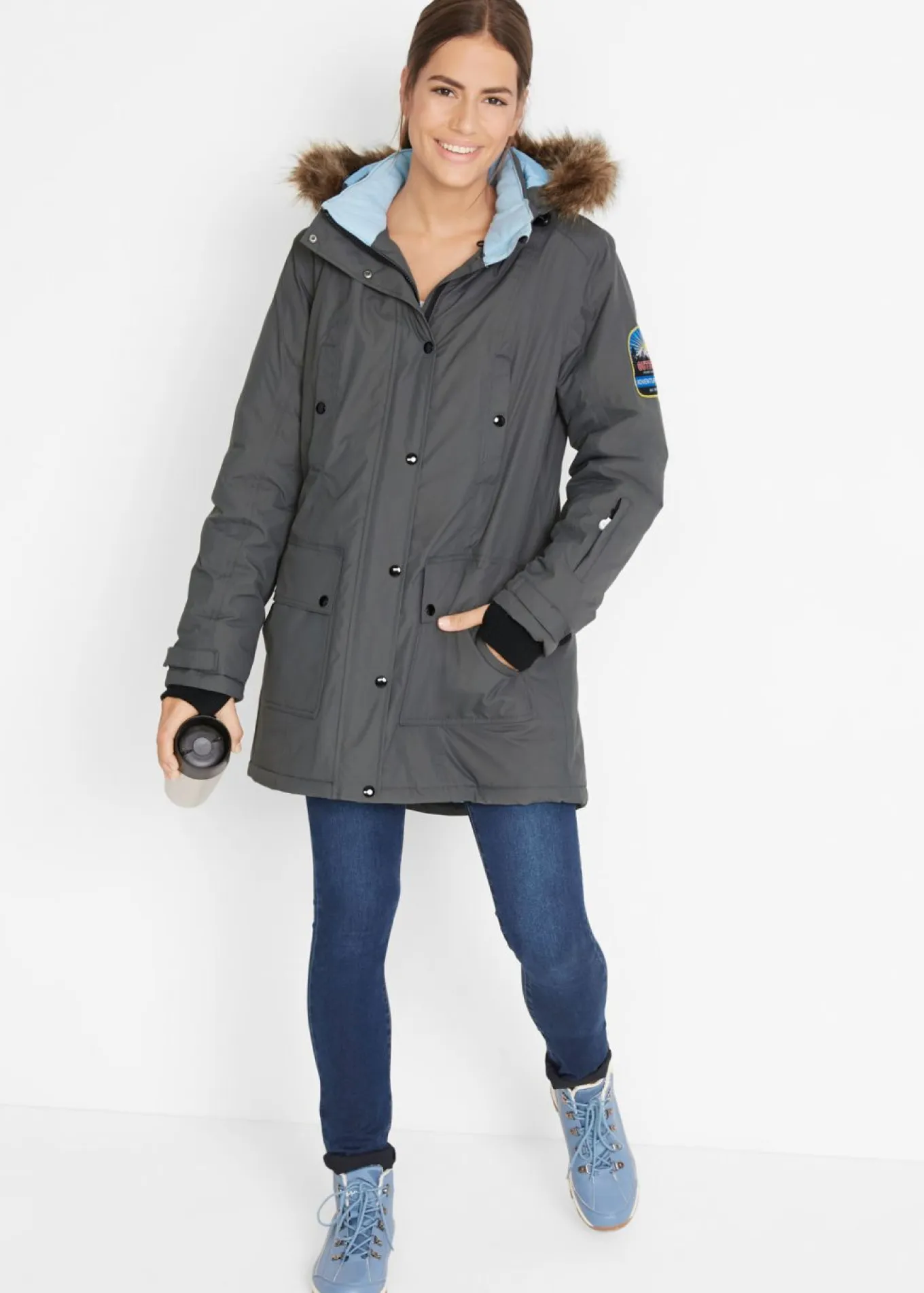 Chaqueta funcional de trekking con capucha, diseño largo y tejido impermeable
