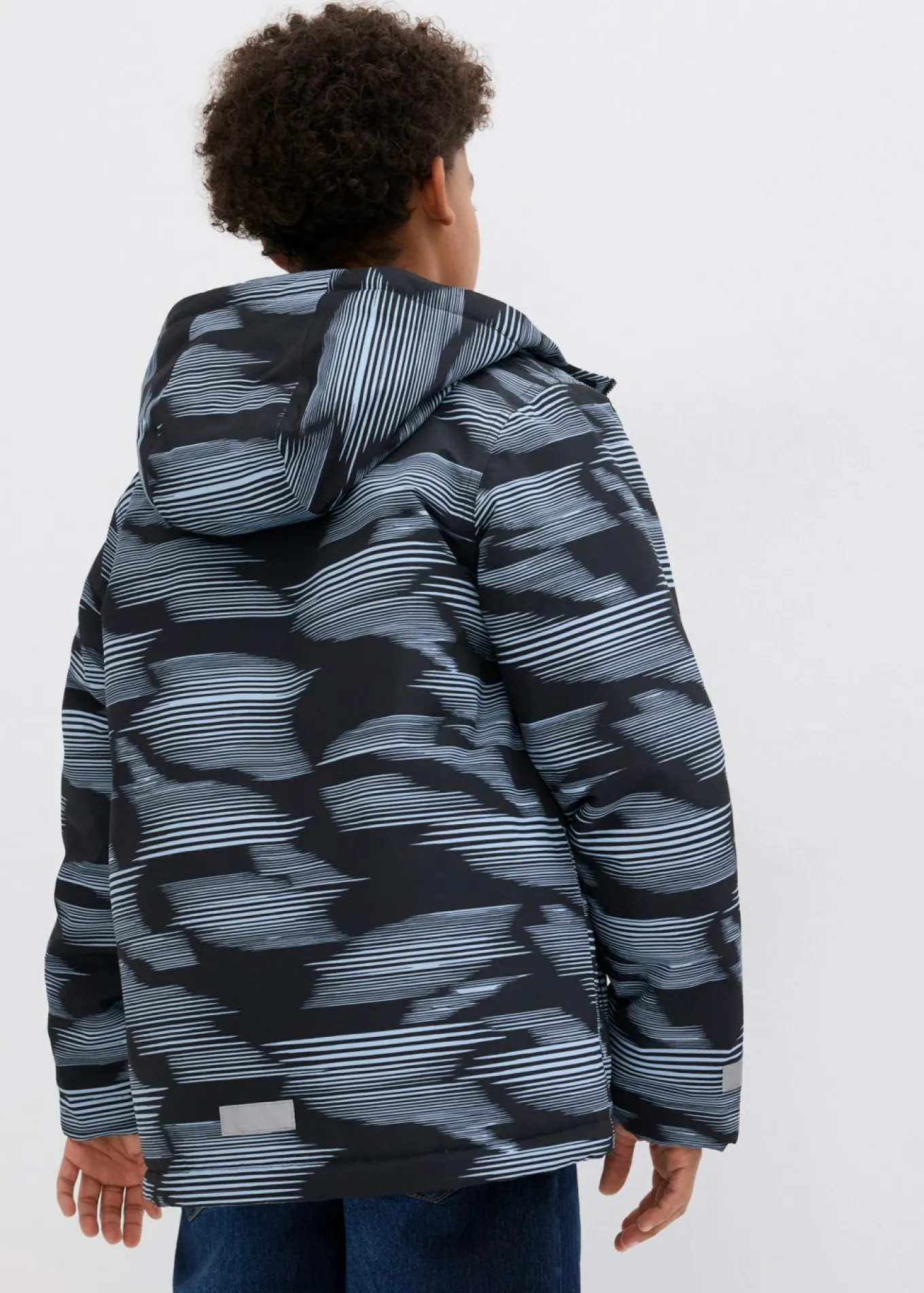 Chaqueta funcional impermeable con detalles reflectantes