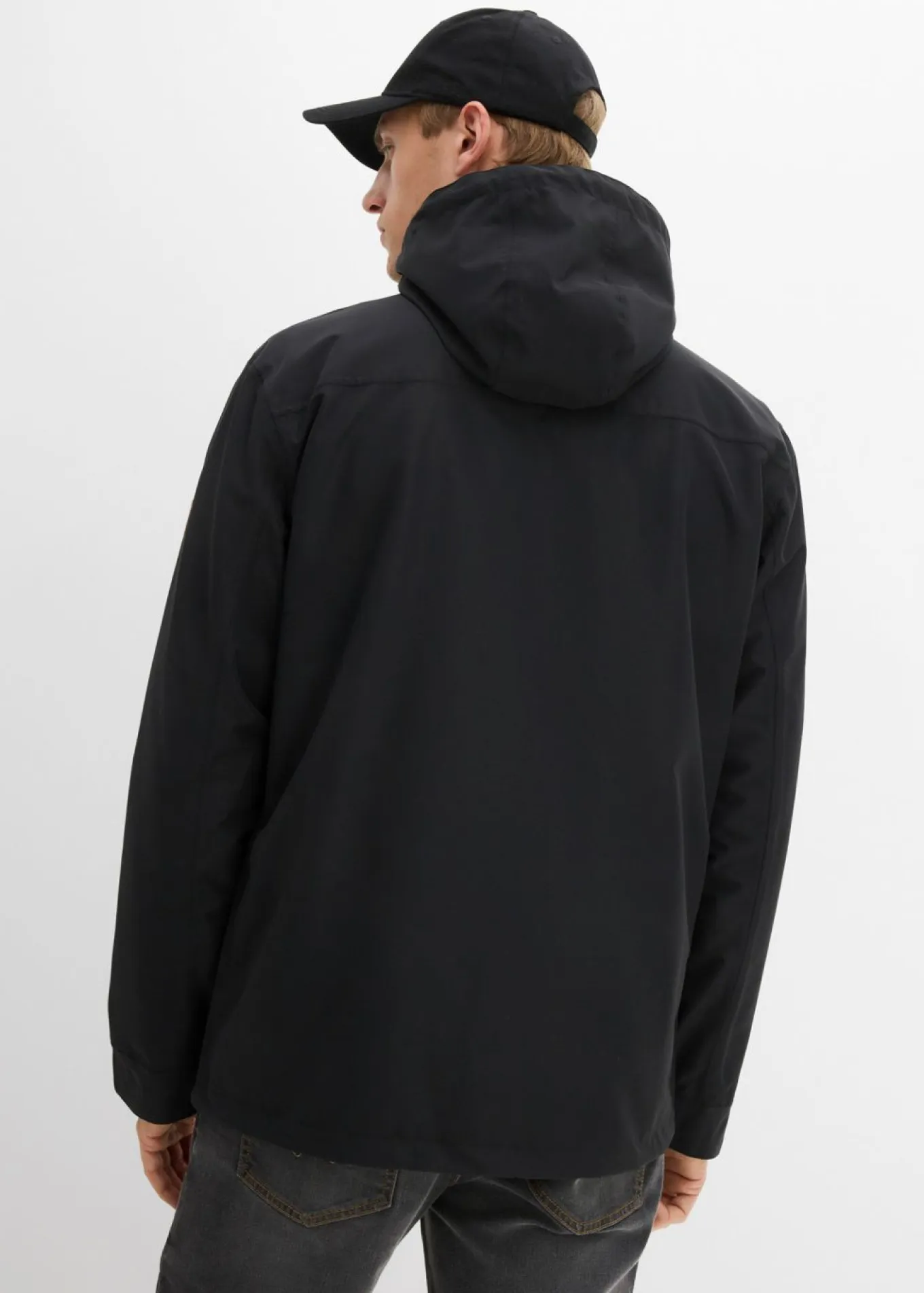 Chaqueta funcional impermeable con capucha y detalles de piel sintética