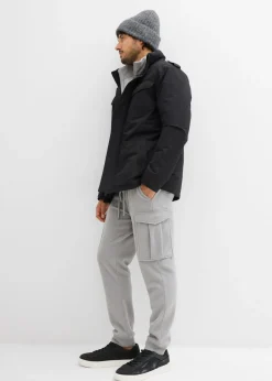Chaqueta funcional impermeable con capucha enrollable