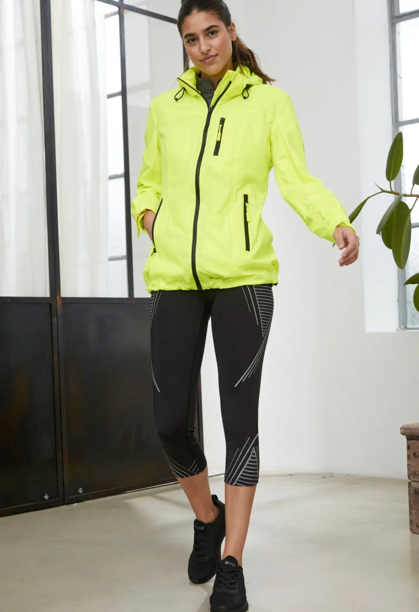 Chaqueta funcional reflectante e impermeable