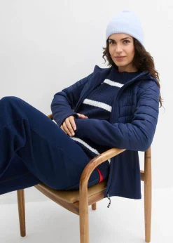 Chaqueta híbrida repelente al agua con inserciones acolchadas y de softshell