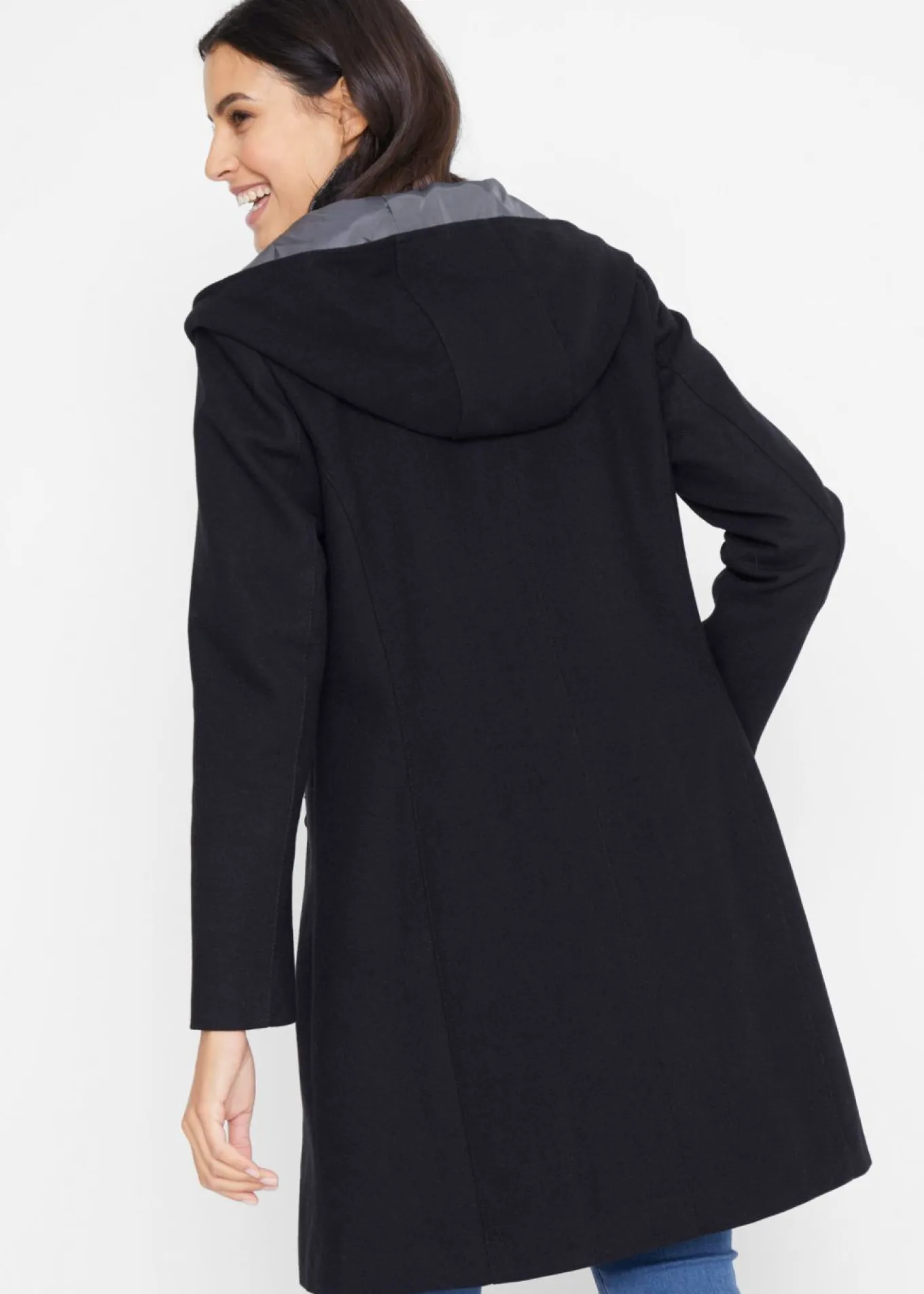 Chaqueta larga con cremallera asimétrica