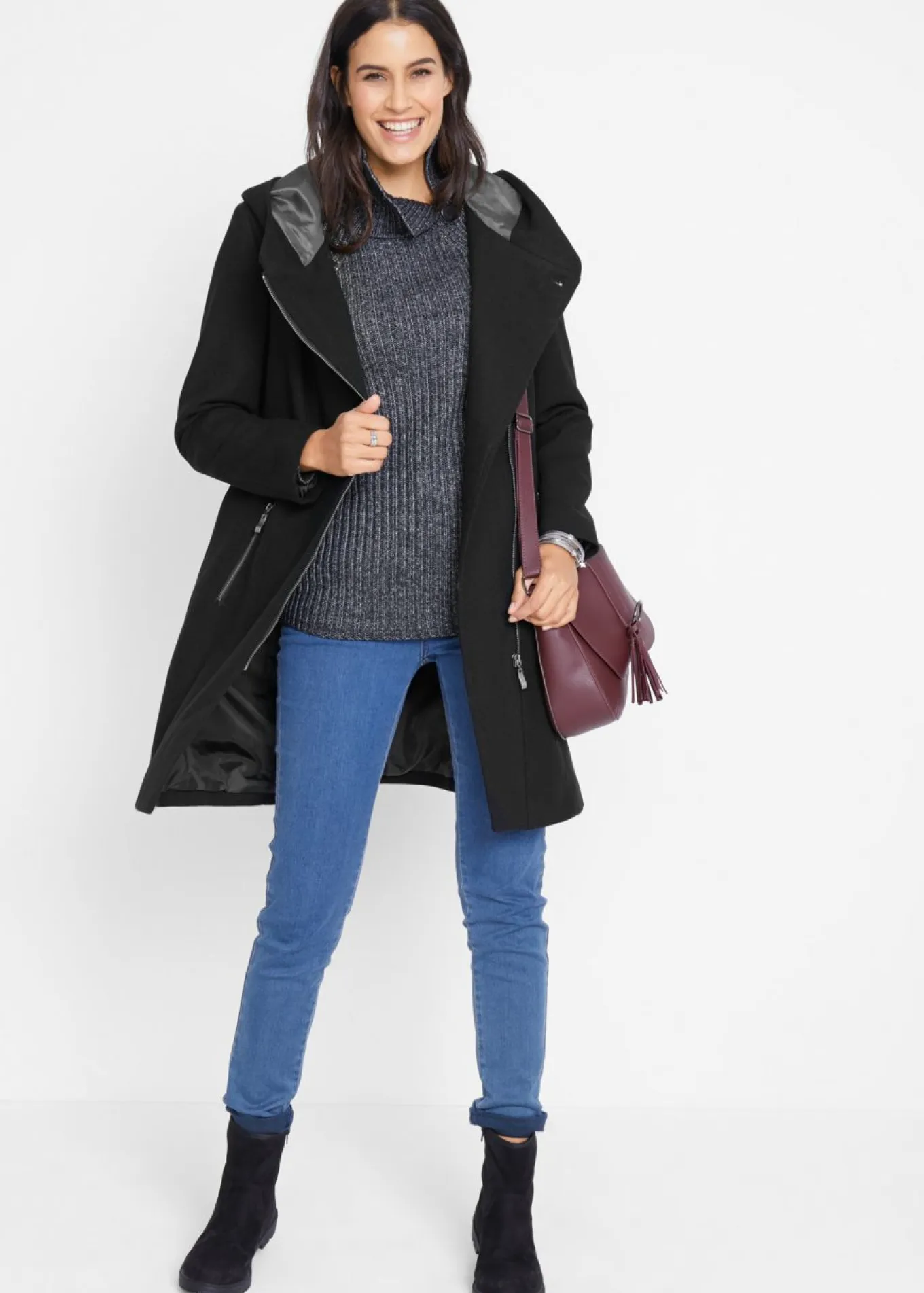 Chaqueta larga con cremallera asimétrica