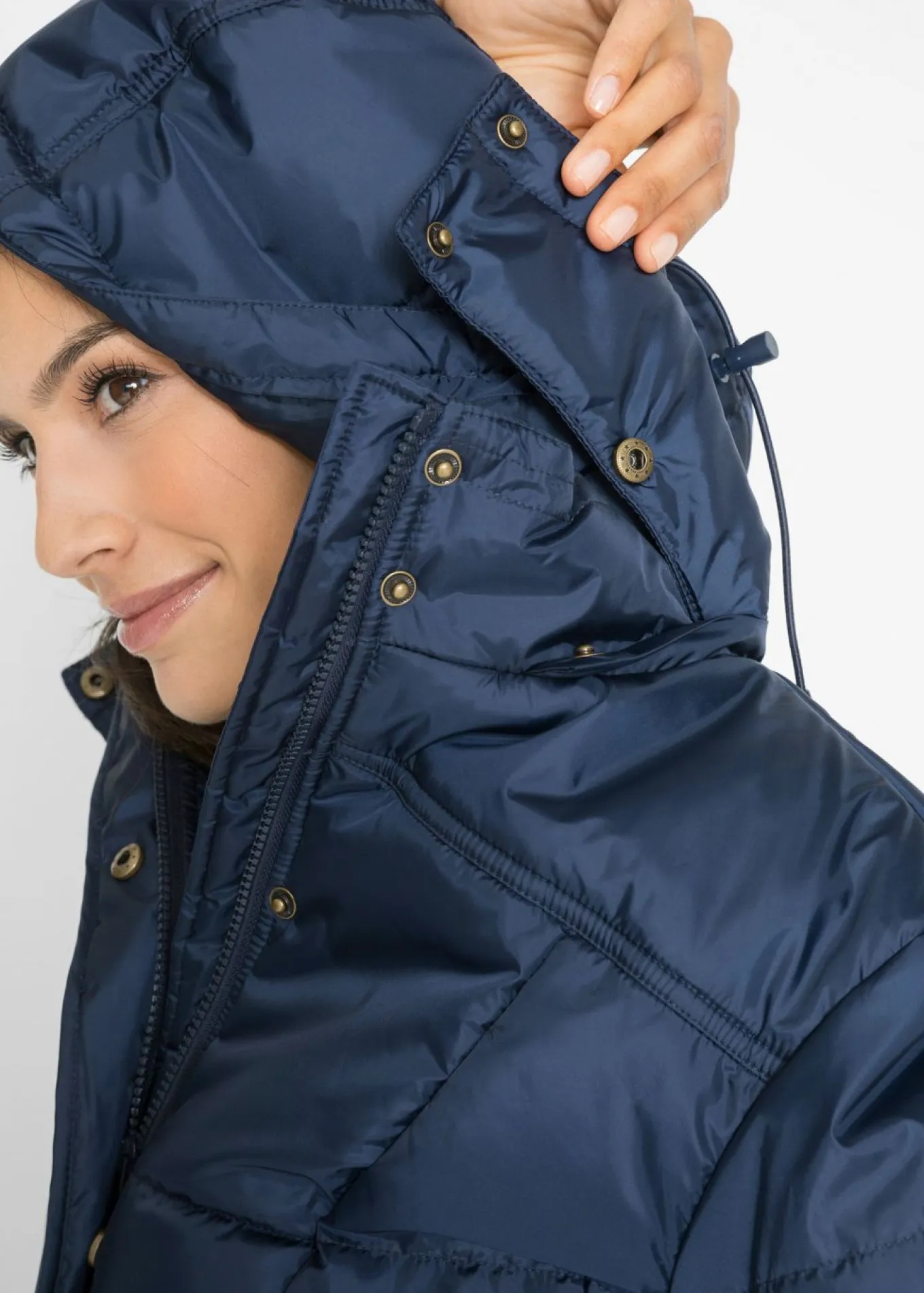 Chaqueta larga guateada con cuello y capucha