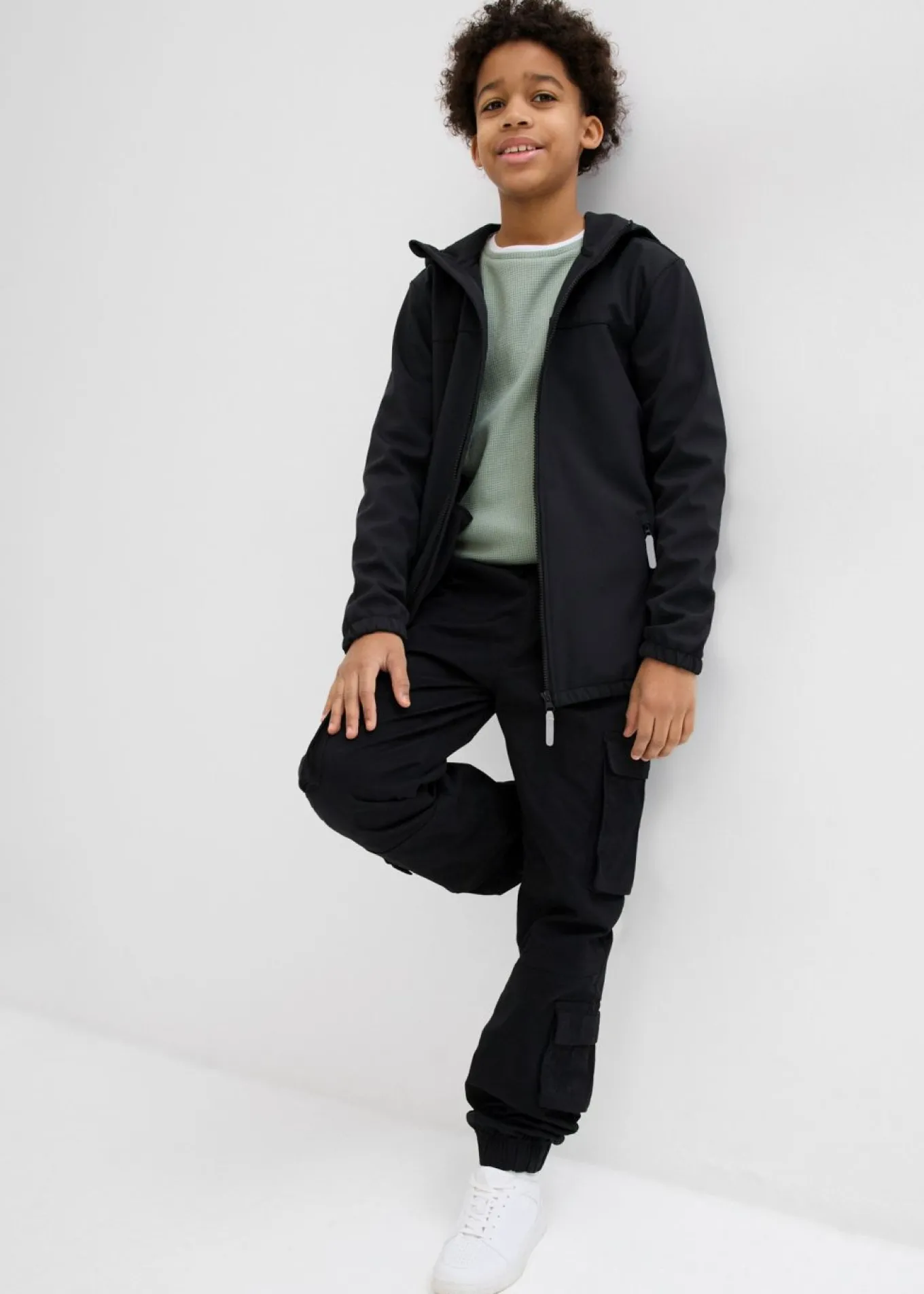 Chaqueta softshell repelente al agua con capucha