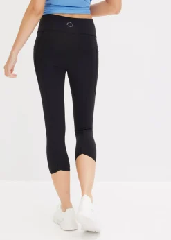 Cómodos leggings deportivos capri con bolsillo para móvil y material de secado rápido