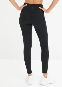Cómodos leggings deportivos con malla y bolsillo para móvil