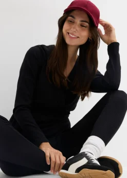Conjunto de camiseta cruzada premamá con cómodos leggings (2 piezas)