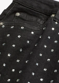 Falda vaquera con aplicación de piedras brillantes