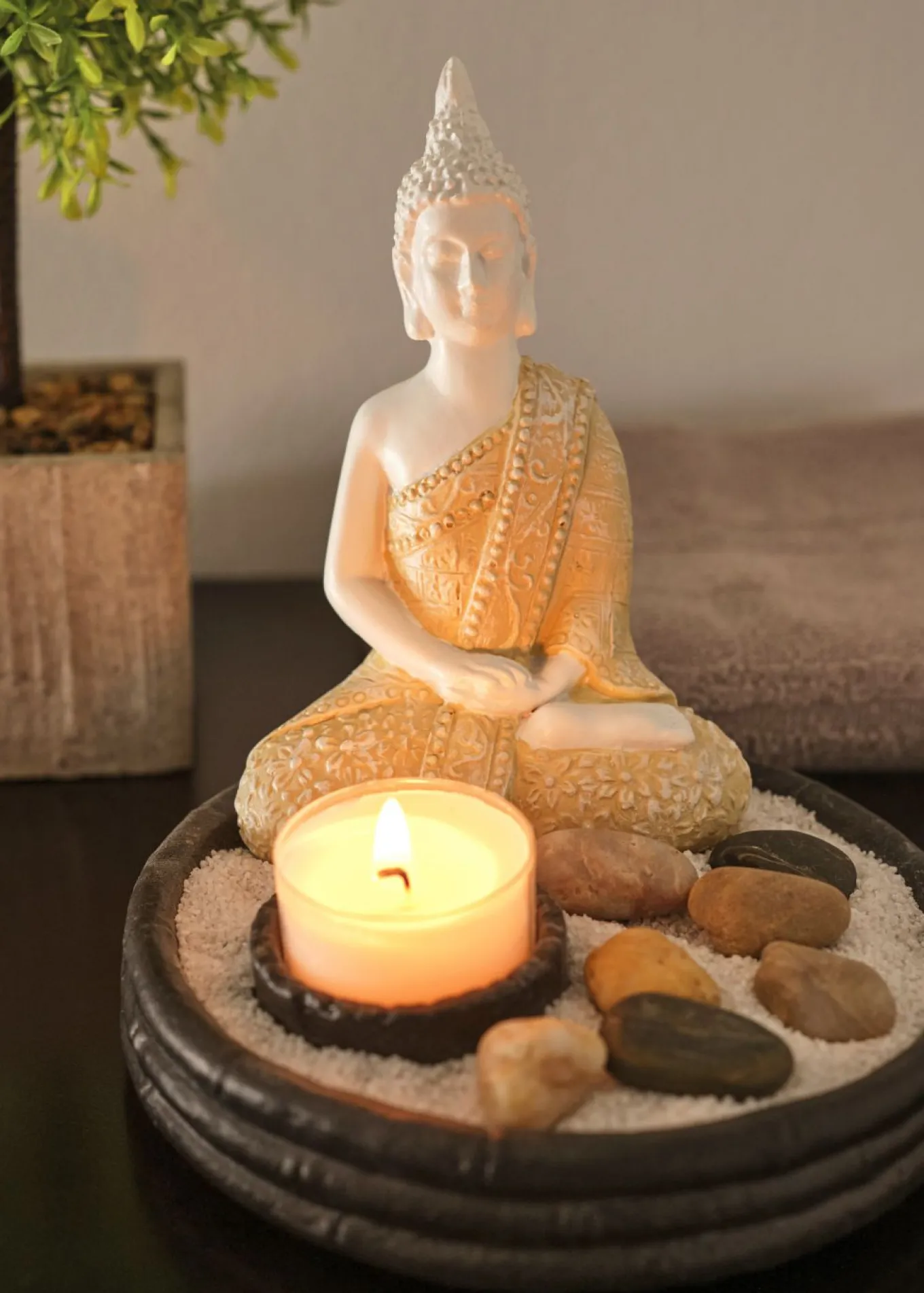 Figura decorativa de Buda con vela