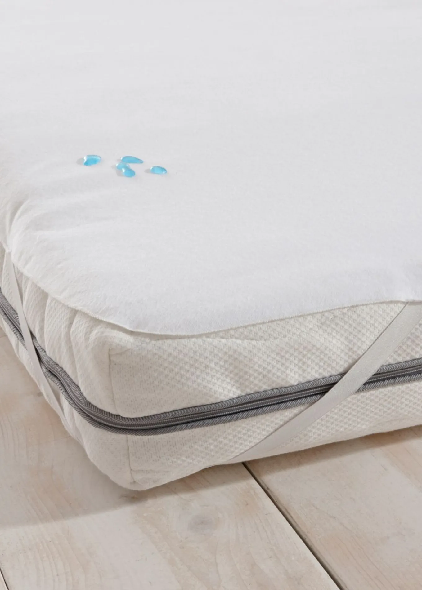 Funda protectora de colchón con gomas elásticas
