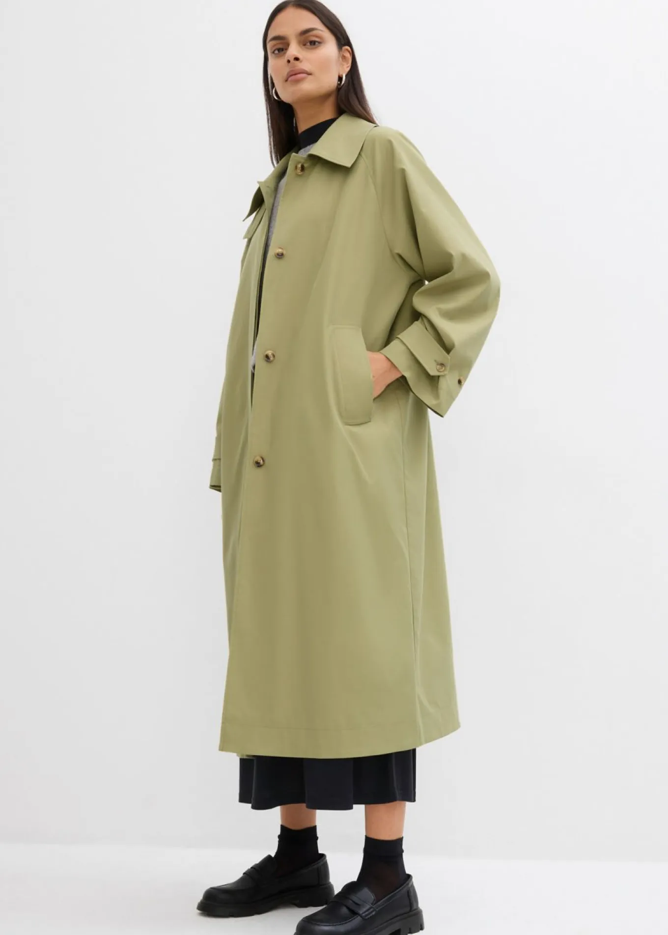 Gabardina con trabillas