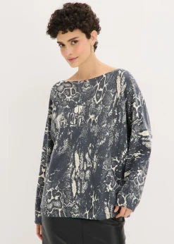 Jersey con mangas tipo murciélago y estampado de serpiente
