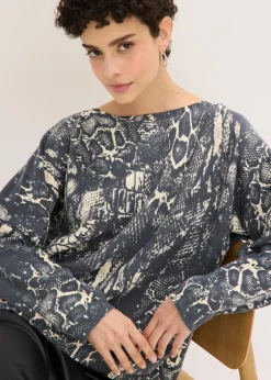 Jersey con mangas tipo murciélago y estampado de serpiente