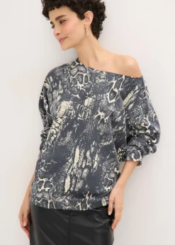 Jersey con mangas tipo murciélago y estampado de serpiente